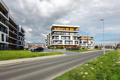 a building on the side of a road at ENERGYLANDIA Zator Apartament Grześ in Zator