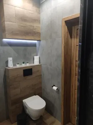 a bathroom with a sink and a mirror at Silver 58 Zator in Zator