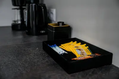 a black box sitting on top of a counter at Native Apartments Paulińska 20 Superior in Kraków