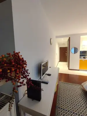 a room with a desk with a computer on it at JM Apartment Old Town Krakow in Kraków