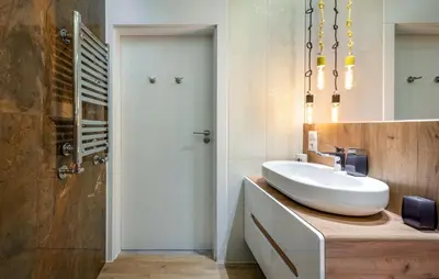 a bathroom with a sink and a mirror at Premium Apartment for Jewish Quarter & Old Town plus Pool in Kraków