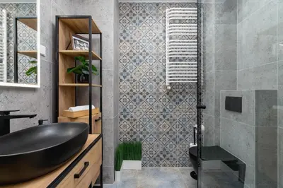 a bathroom with a black sink and a shower at Deluxe Studio Cracow Ariańska by Noclegi Renters in Kraków