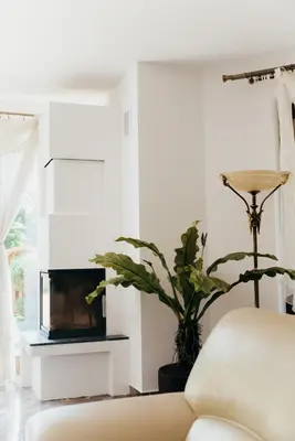 a living room with a couch and a tv at Zarabie Residence in Myślenice