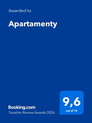 a blue screen with the text upgraded toarrangement at Apartamenty in Miechów