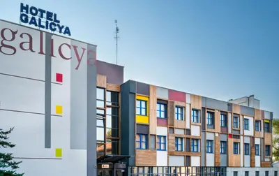 a building with a sign for the hotel gallery at Hotel Galicya in Kraków