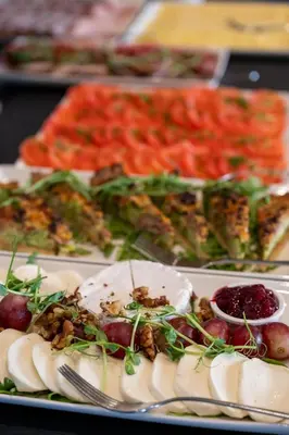 a plate of food with appetizers on a table at Hotel Atrium in Kraków