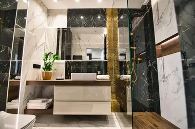 a bathroom with a sink and a shower at Boutique 78 by Housine in Zator