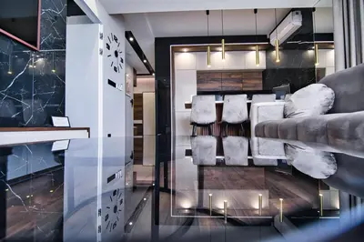 a living room with a couch and chairs at Boutique 78 by Housine in Zator