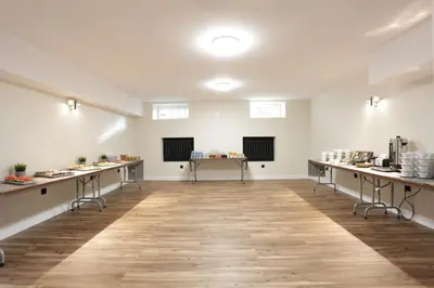 a large room with tables with food on them at Hotel Krakus in Kraków