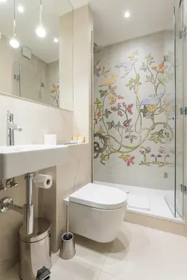 a bathroom with a toilet and a shower at Hotel Ester in Kraków