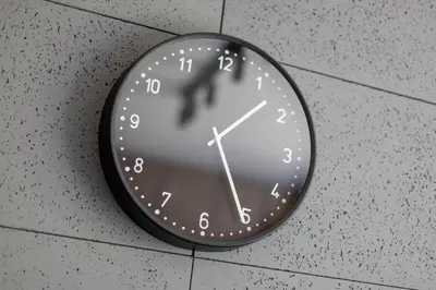 a clock is hanging on a wall at Modern Apartment Śródmiescie Kraków by Noclegi Renters in Kraków