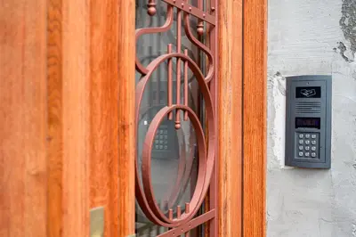 a close up of a window with a pay phone at Native Apartments Nowowiejska 9 Deluxe in Kraków