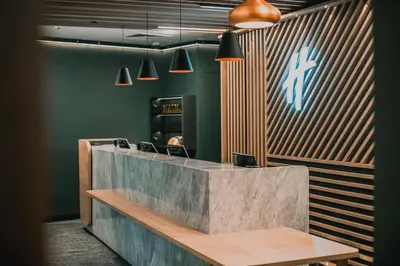 a gym with treadmills and elliptical machines at Holiday Inn Krakow City Centre by IHG in Kraków