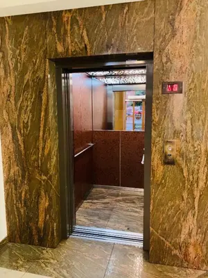 an open door to a hallway in a building at Matejko Hotel in Kraków