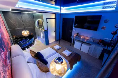 a room with a bed and a table in it at Stacja Galicja Rooms blisko Energylandia in Trzebieńczyce