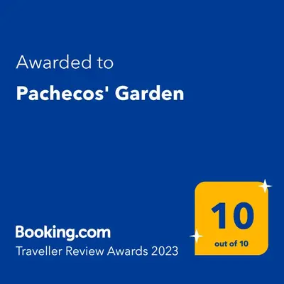 a yellow sign with the text awarded to packetos garden at Pachecos' Garden in Kraków