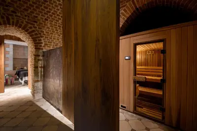 an entrance to a building with a wooden door at Hotel Copernicus in Kraków