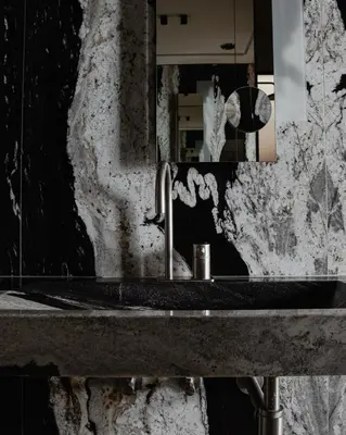 a bathroom with a sink and a mirror at Hotel Stary in Kraków