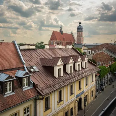 a view of a city with buildings and a clock tower at Kazimierz Secret in Kraków