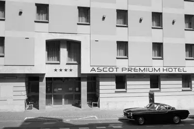 a car parked in front of a hotel at Ascot Premium Hotel in Kraków
