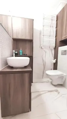 a room with two beds and a kitchen and a couch at Ariańska 8A by Homeprime in Kraków