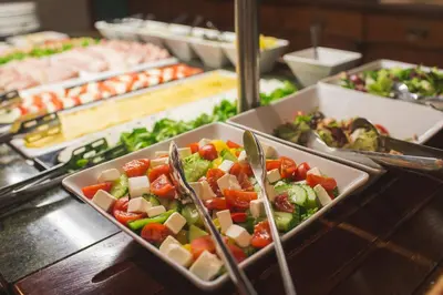 a buffet line with many different types of food at Dwór w Tomaszowicach in Modlnica
