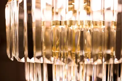a close up of a glass bottleneck with bottles at Native Apartments Nowowiejska 9 in Kraków