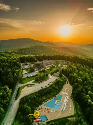 an aerial view of a resort with a pool at Kocierz Resort in Targanice
