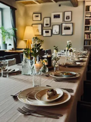 a long table with plates of food on it at Piwnica Rycerska Kęty in Kęty