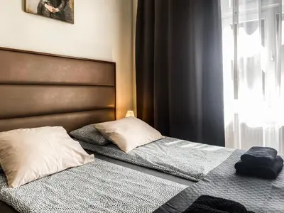 two beds sitting next to each other in a bedroom at Charming Apartment, Wawel & Old Town Krakow II in Kraków