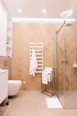a bathroom with a shower and a toilet and a sink at Forest 21 by Housine in Zator