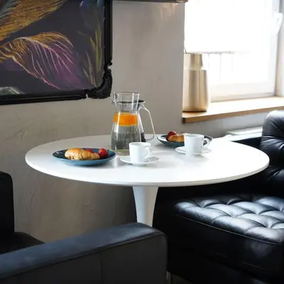 a white table with a blender and a plate of food at Apartament z Jacuzzi w Sercu Krakowa in Kraków