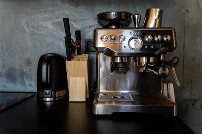 a coffee maker sitting on top of a counter at Domki Jasicówka pod Łysą Górą in Limanowa