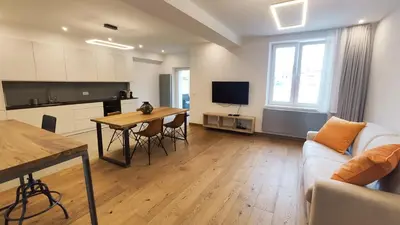 a living room with a couch and a table at Bogusławskiego 5 by Homeprime in Kraków