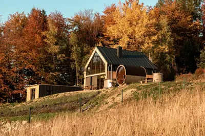 a small house on top of a hill at Reset Kudłacze in Pcim