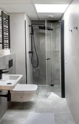a bathroom with a shower and a sink at Aparts Near Main Station in Kraków