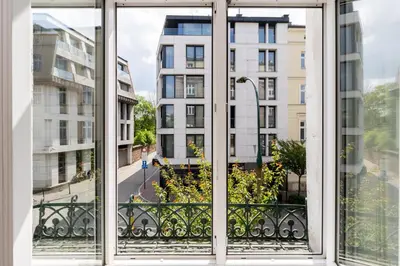 an open window with a view of a building at Brzozowa Apartments by Hostly in Kraków