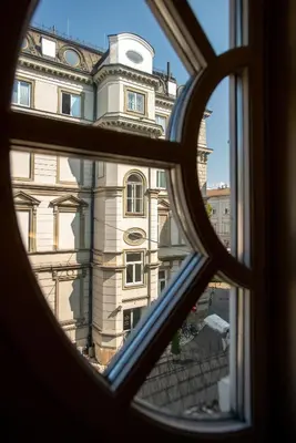 a view of a building from a window at Dom Pugetów in Kraków