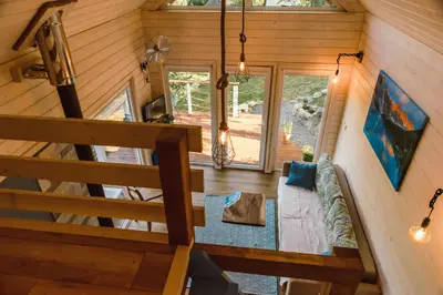 an overhead view of a living room in a tiny house at RESETówka nr 3 - domek na odludziu z mega widokami - Lazurowe Love in Jaszczurowa