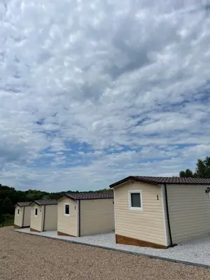 a row of garages parked in a row at Słoneczne ranczo Zator Energylandia in Zator