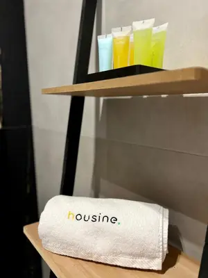 a towel and some drinks on a shelf at Chill & Fun 22 by Housine in Zator