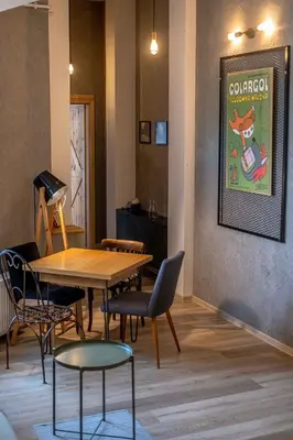 a dining room with a table and chairs at Orzeszkowej PREMIUM Apartament in Kraków