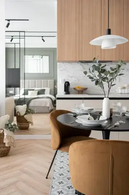 a living room with a table and a bedroom at #2 OLIVE Apartment City Center FREE GARAGE in Kraków