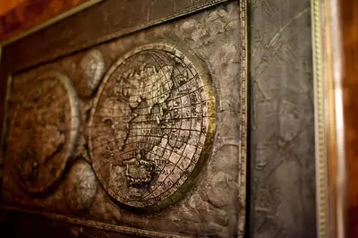 a close up of a wooden door with a design on it at Aparthotel Oberża in Kraków