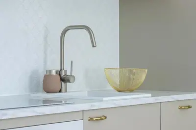 a kitchen counter with a sink and a bowl at Apartment with Balcony & Parking Mogilska by Renters Prestige in Kraków