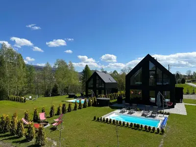a house with a swimming pool in a yard at STODOŁY94 in Mordarka