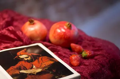 a picture of a man with strawberries and apples at Cadena Gallery Apartments Matejko in Kraków