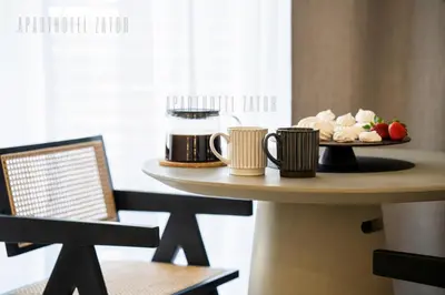 a table with a plate of food on top of it at Aparthotel ZATOR Glam 52 jacuzzi in Zator