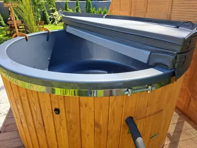 a wooden bucket with a sink on top of it at Leśny zakątek malediwy Jacuzzi free in Jaworzno