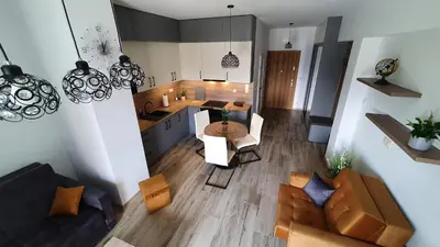 an overhead view of a kitchen and a living room at Apartament 20 Zator in Zator